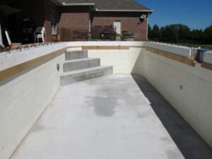 Pool walls built with ICF blocks. Showing the walls of the unfinished pool so you can see the ICF blocks.