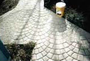 Stamped concrete walkway in Minden, Nevada. (4000 ft elevation) 7 years freeze-thaw exposure after single Crystal Lok® application. No damage to treated right side. Untreated left side destroyed by freezing after 2-3 years.